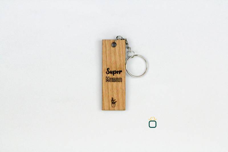 Besoin de confectionner des porte-clés en bois personnalisés pour mon entreprise à Plaisir 78.