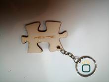 Besoin de trouver une entreprise capable de personnaliser des porte-clés puzzle en bois à Vénissieux 69
